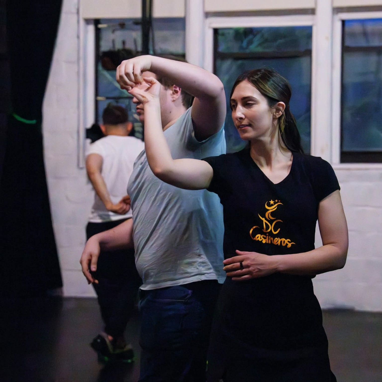 Students practice partner work in a DC Casineros class at Dance Place.