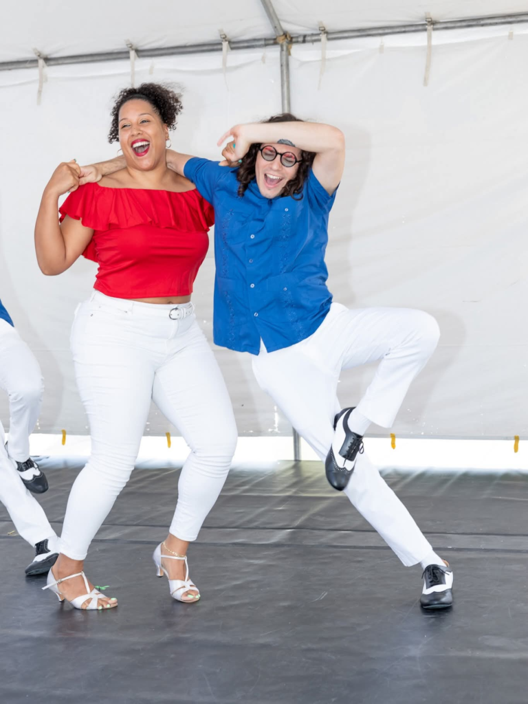 Evan Kreiensieck and Naomi performing with DC Casineros at DanceAfrica DC